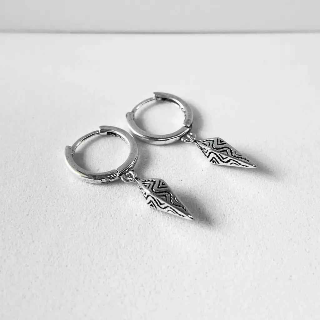 Sculpted antique earring